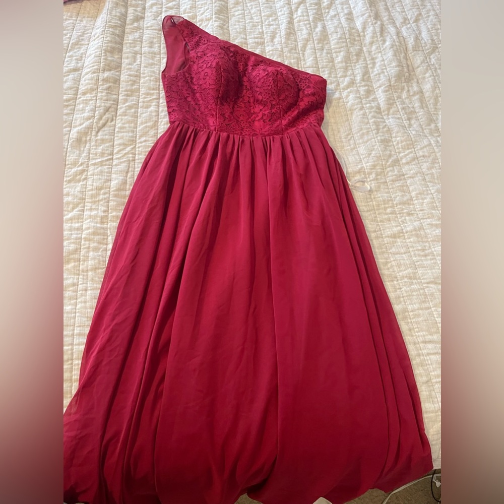 Azazie bridesmaid dress burgundy in color. Size 8. Worn once.